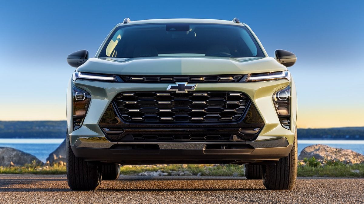 2026 Chevrolet Trax front view parked by the water at sunset